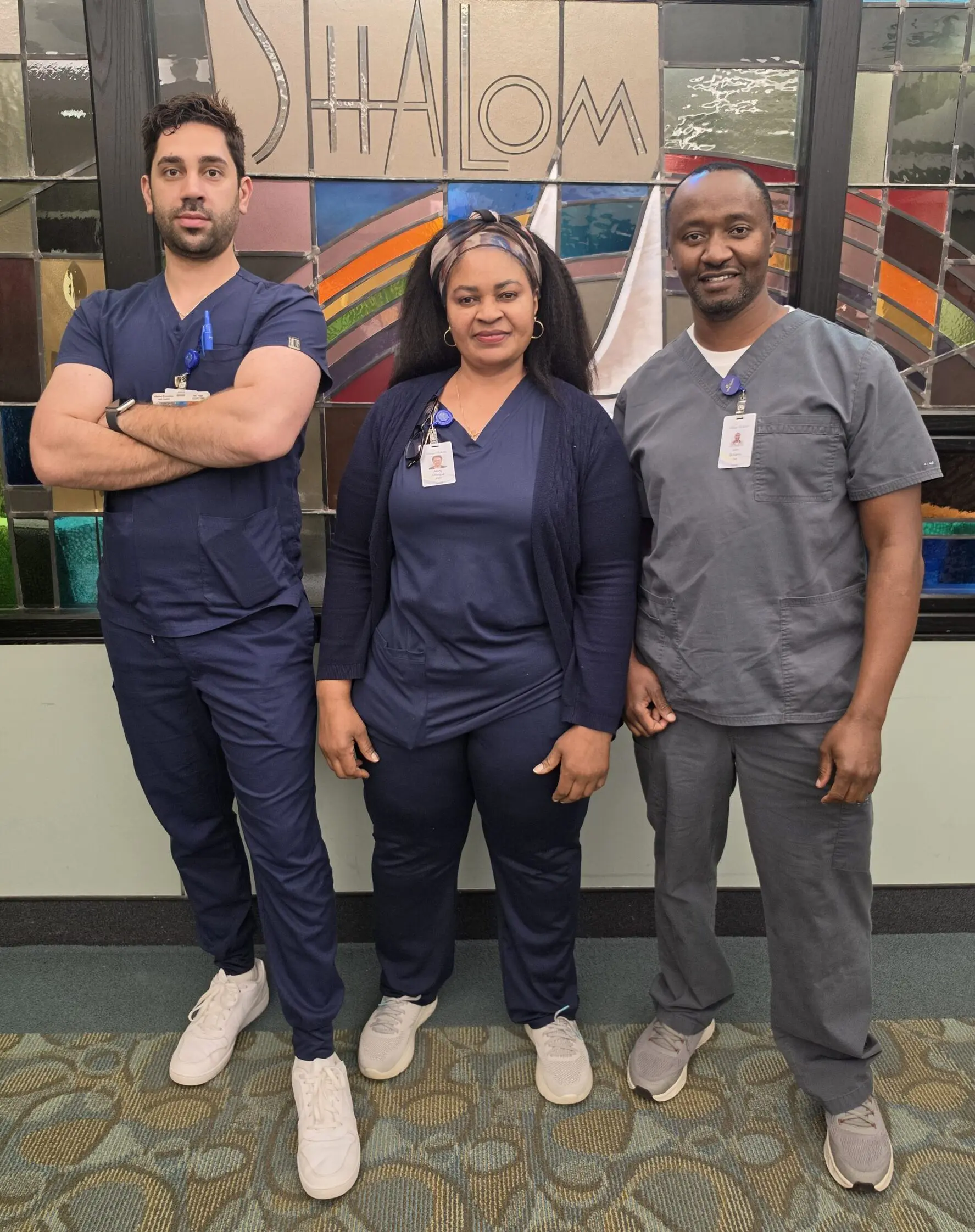 Three nurses at Village Shalom smiling for the camera for Nurses Week