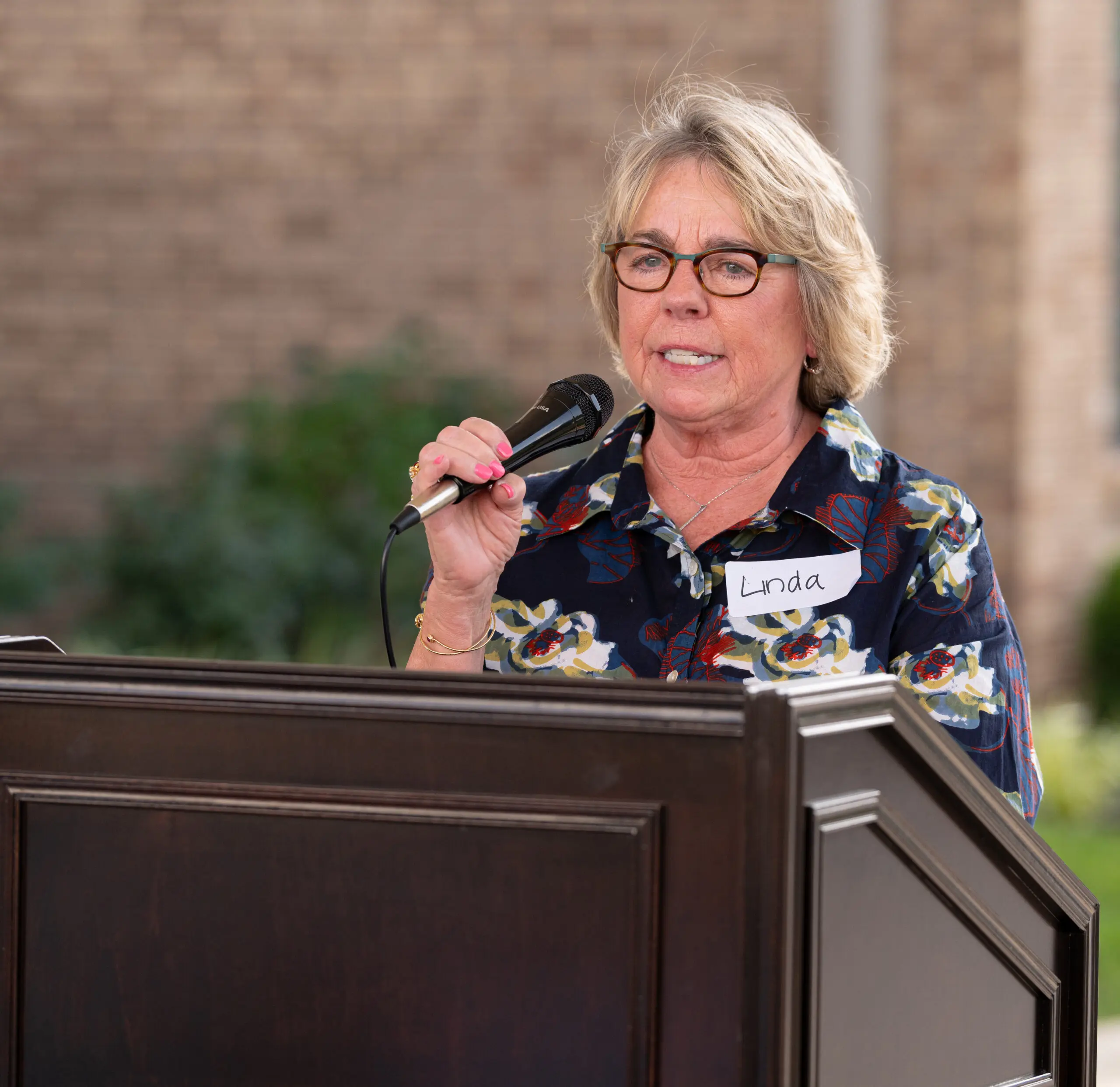 Linda Clarkson speaking at Bettinger Place Event