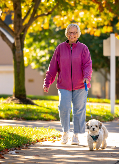 Resident walking dog
