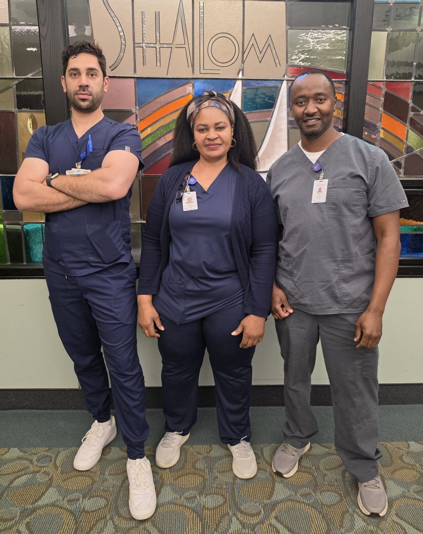 Three nurses at Village Shalom smiling for the camera for Nurses Week