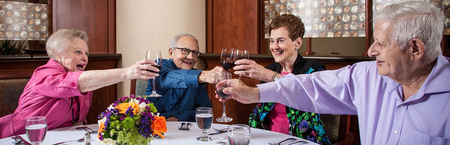 Seniors giving a toast
